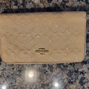 COACH embossed shiny wallet